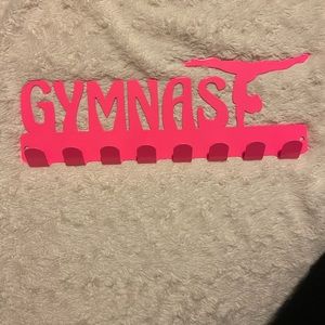 Pink Gymnast medal display with hooks.